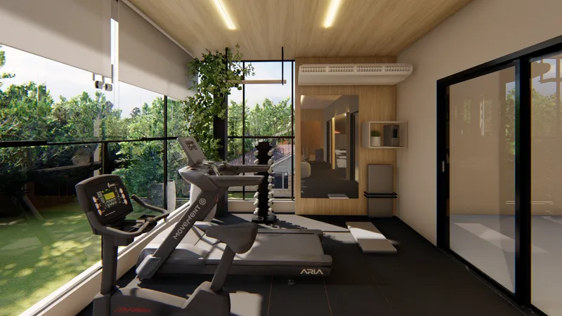 Academia residencial com vista para o jardim e equipamentos de ginástica - Arquiteta Melissa